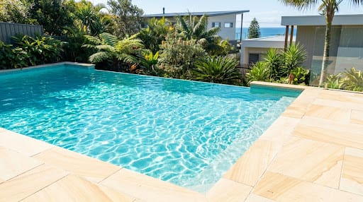 Sparkling clean Central Coast backyard pool serviced by Magic Klean